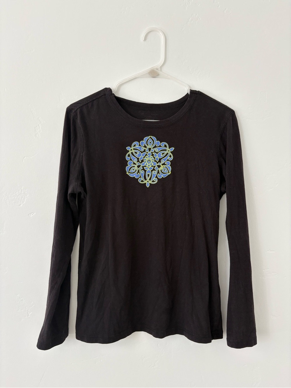 Black Long-Sleeve Women’s Top with Blue-Green Medallion